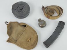 A WWII Russian PPSH-41 set comprising stick magazine, drum magazine, pouch , sling and oil bottle.