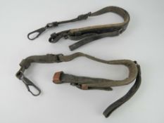 A pair of WWII MG42 padded leather lafette straps.