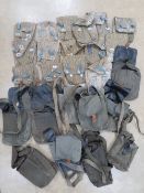 Twenty-five assorted AK magazine pouches, from the AK east Germany pouch to the AK quad pouch.