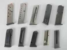A quantity of ten assorted pistol magazines inc two marked for Smith & Wesson.