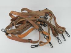 Nine WWII MG42 leather slings.