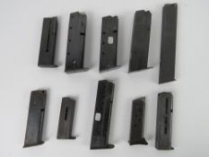Ten assorted pistol magazines, one being Spanish made.