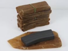 A quantity of six M16A1 un-issued magazines.
