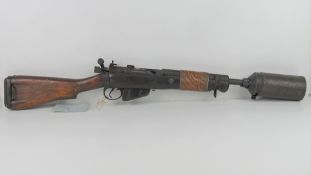 A deactivated Lee Enfield grenade launcher having working bolt action. With UK certificate.
