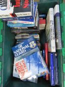 A box containing a quantity of assorted military and aviation themed books.