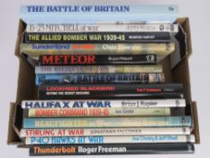 A quantity of military aviation themed books, each having various signature within,