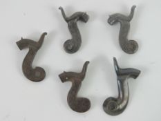 Five percussion cap rifle hammers.