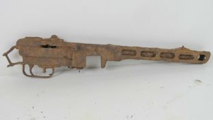 A WWII PPSH-41 rifle part in relic condition.