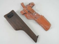 A reproduction Mauser C96 broom handle shoulder stock, with reproduction holster.
