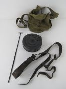 A WWII PPSH-41 sling and magazine pouch with cleaning rod.