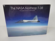 'The NASA Northrop T-38' signed by Story Musgrave, 'Photographic Art from an Astronaut Pilot'.