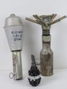 Three inert grenades being an F1 limonka, Hungarian 'house killer' and a Russian PTAB cluster bomb.