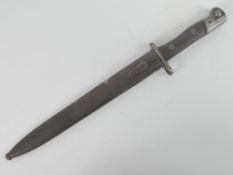 A WWII Siamese Mauser bayonet with scabbard, blade measuring 25cm in length.