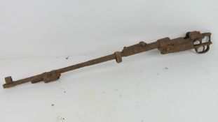 A WWII German K98 rifle part in relic condition.