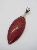 A 925 silver and red stone pendant, 6cm