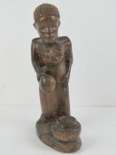 An African rosewood carving depicting a