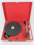A Fidelity portable record player.