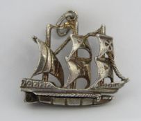 An unusual charm or pendant in the form