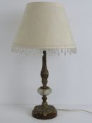 An onyx and brass lamp base complete wit