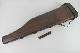 A brown leather 'leg of mutton' gun case