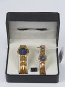 A 'His and Hers' stainless steel gents w