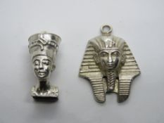 A silver charm in the form of Nefertiti