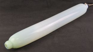 A 19th century milk glass oversized 'rol