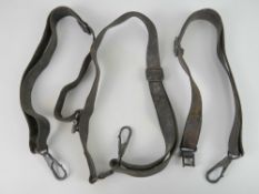 Three MG34 leather slings.