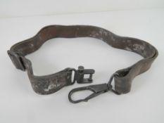 A WWII German MG34 brown leather sling.