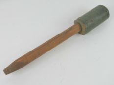 An inert WWII German concrete stick mine