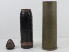 An inert WWI British 18lb artillery shra