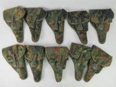 Ten German Bundeswehr P38 holsters.