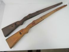 Two WWII K98 wooden stocks, a/f.