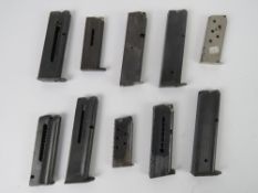 Ten assorted pistol magazines, one being