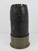 A WWI British 4.5cm Howitzer shell with head, dated 1916.