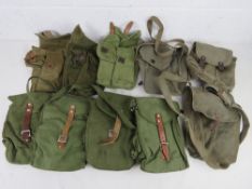 A quantity of assorted AK magazine pouches. Ten items.
