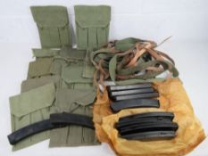 Ten PPS-43 magazine pouches, together with ten PPS-43 slings and ten PPS-43 magazines.