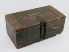 A wooden WWII German ammunition box, with original stencilling on the outside of the box and on lid,