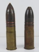Two 37mm pom pom shells dated 1917 and 1914 respectively.