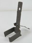 A Bren gun drum magazine adaptor.