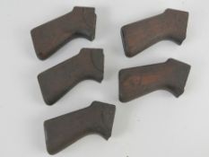 Five L1A1 SLR wooden pistol grips.