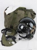 A Pilots FPV Gentex helmet in bag including head phones, microphone, and lens covers.