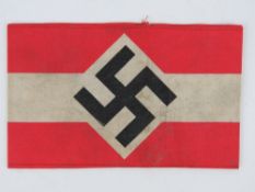 A WWII Hitler Youth arm band, in frame.