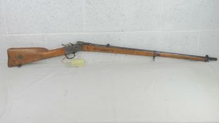A deactivated Swedish Military Remington Rolling Block 8x58R Calibre with matching numbers.