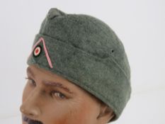 A WWII German Panzer side cap, size 58.