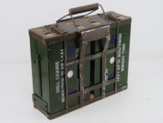 British L4A1 Drill Charge demolition slabs in transit case.