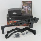 A Micro Roni Conversion System for the Glock 19 and Glock 23. CAA manufacture and 'as new' in box.