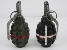 Two inert F1 Limonka training grenades with fuses.