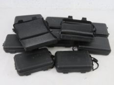 Ten small Peli transit cases with foam inserts, approx. 16.5 x 10.5cm.