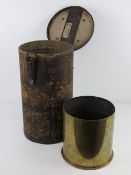 A WWI German 21cm shell case container and 1917 shell.
